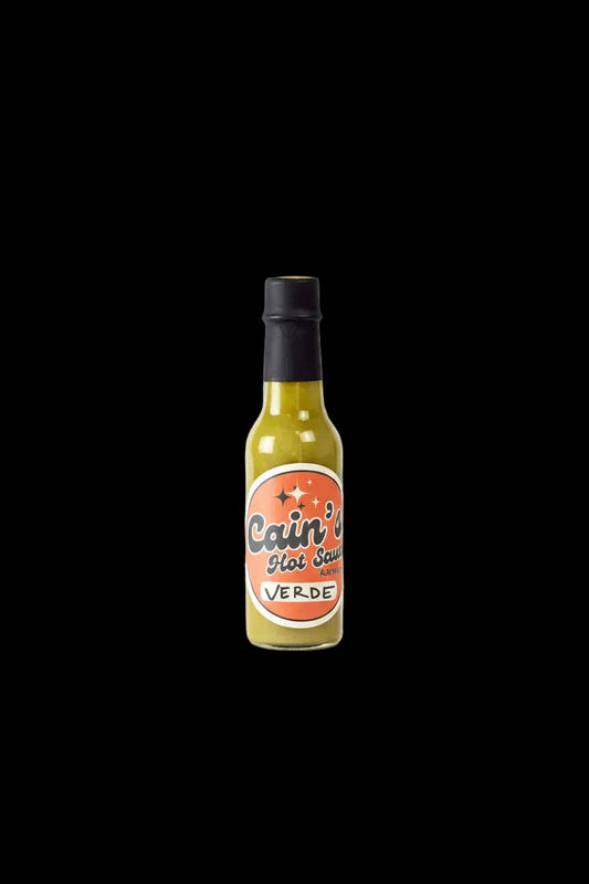 Bottle of Cain's Hot Sauce on a transparent background